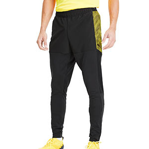 Pantalón Puma ftblNXT Pro - Pantalón largo de entrenamiento Puma - negro y amarillo - frontal