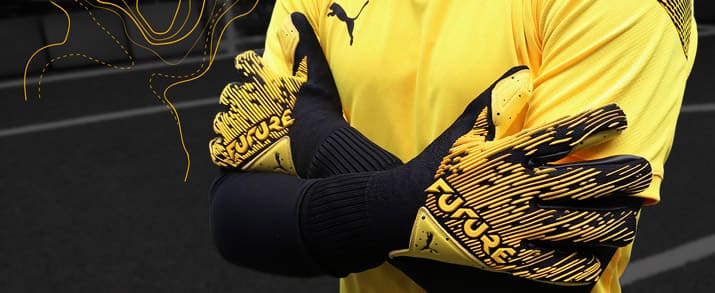 Guantes marca Puma de la colección Spark Pack color amarillo para niño